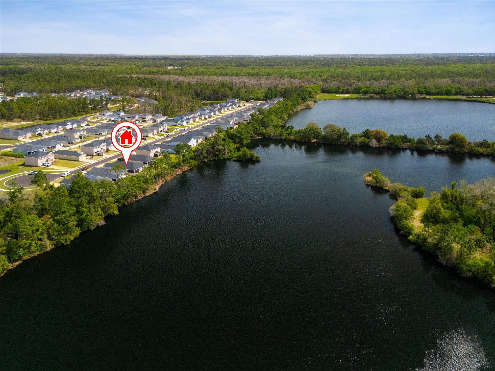 89 Kingsley Pk Way St. Augustine, FL 32084 - Photo 48 of 67 an aerial view of residential houses with outdoor space and lake view