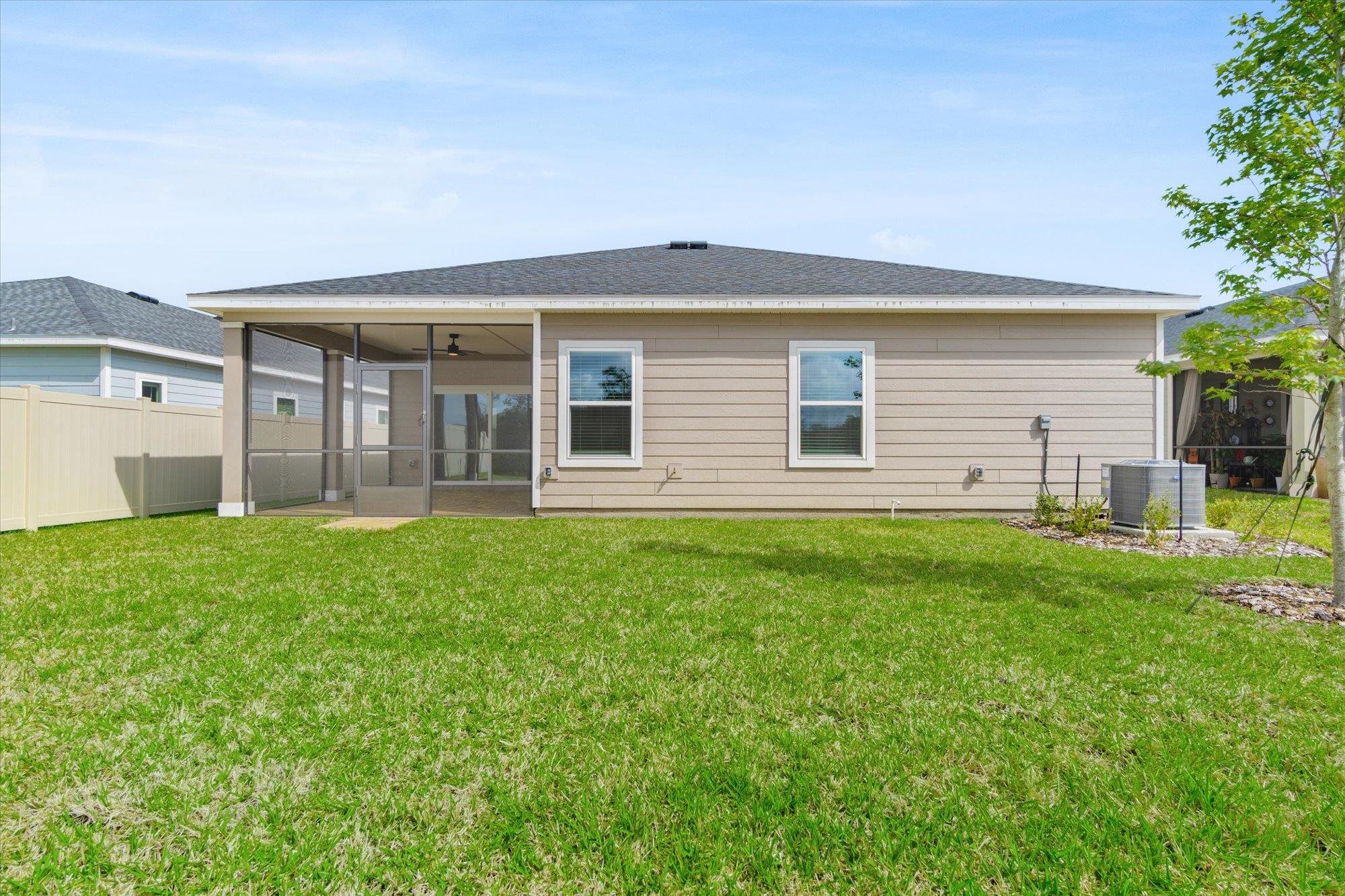 89 Kingsley Pk Way St. Augustine, FL 32084 - Photo 54 of 67 a view of a house with a backyard