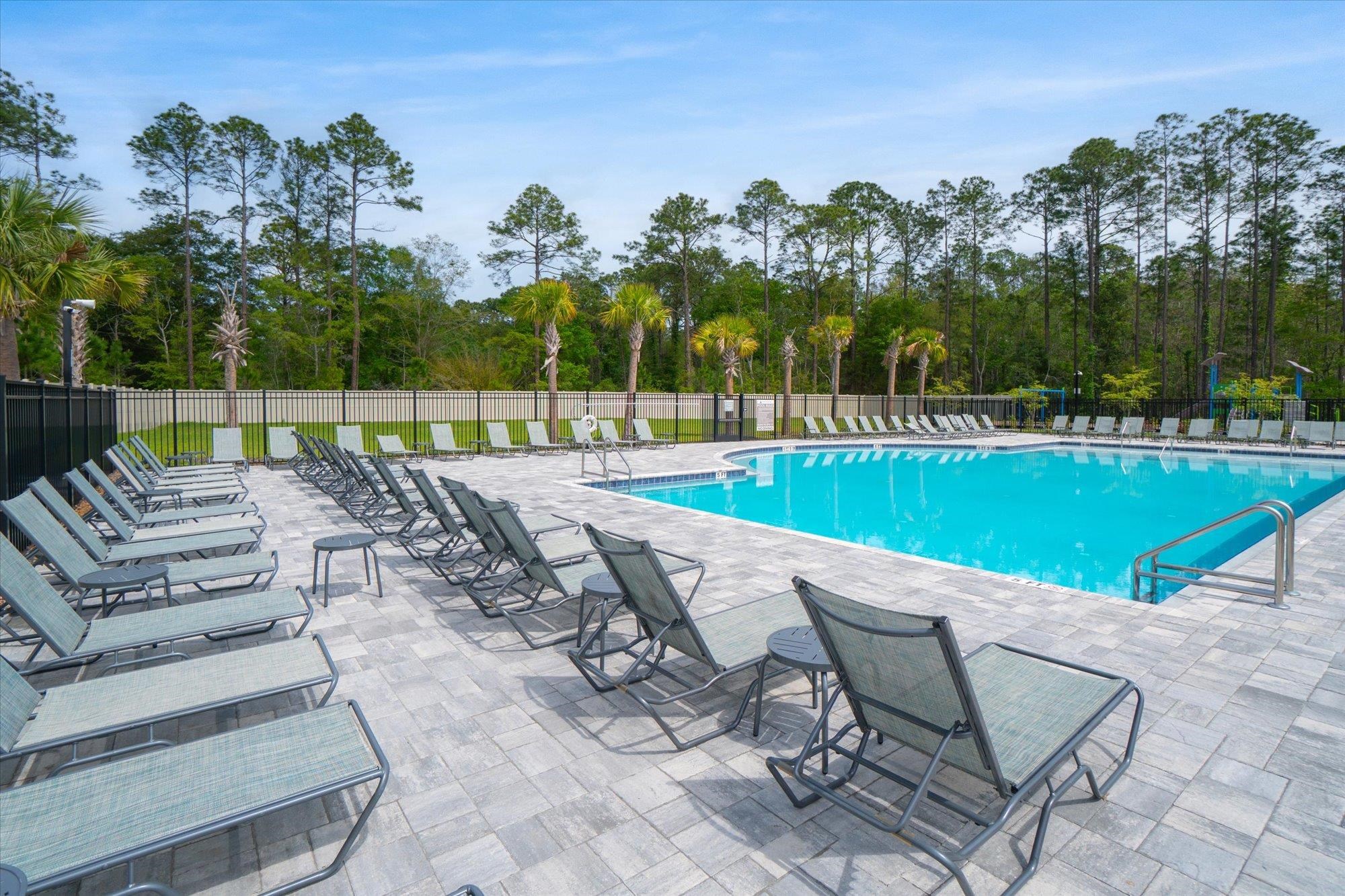 89 Kingsley Pk Way St. Augustine, FL 32084 - Photo 64 of 67 Community pool with a patio