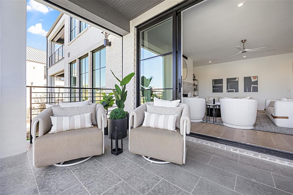 350 North O Connor Ridge Boulevard, Unit 21 Irving, TX 75038 - Photo 12 of 36 Photos of model showroom. Villa Seven #21 is under construction