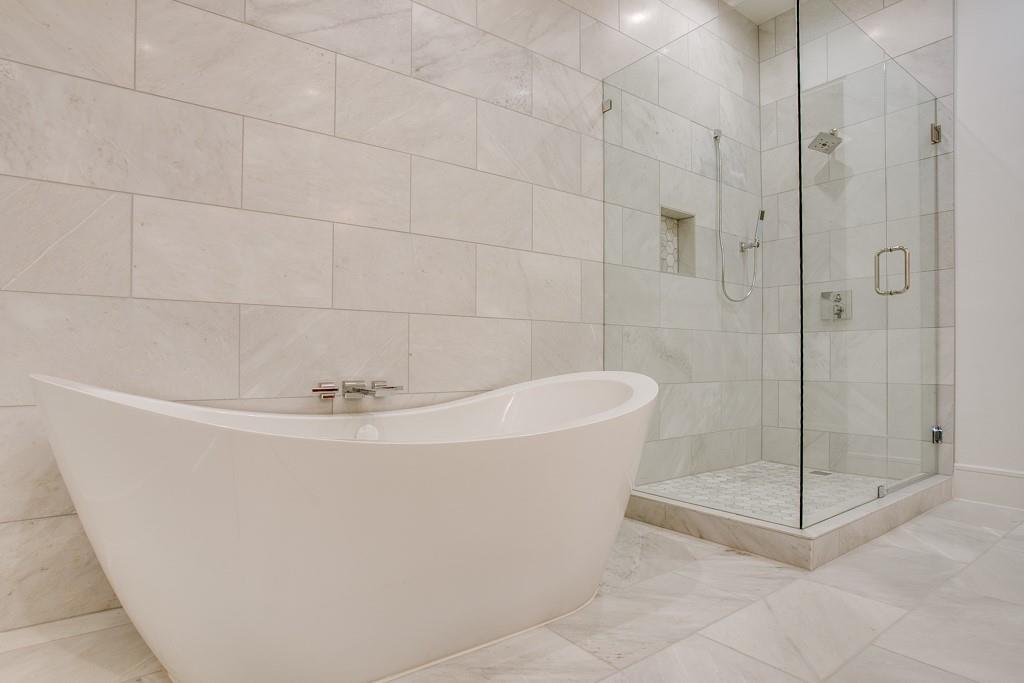 350 North O Connor Ridge Boulevard, Unit 21 Irving, TX 75038 - Photo 25 of 36 Photos of model showroom. Villa Seven #21 is under construction