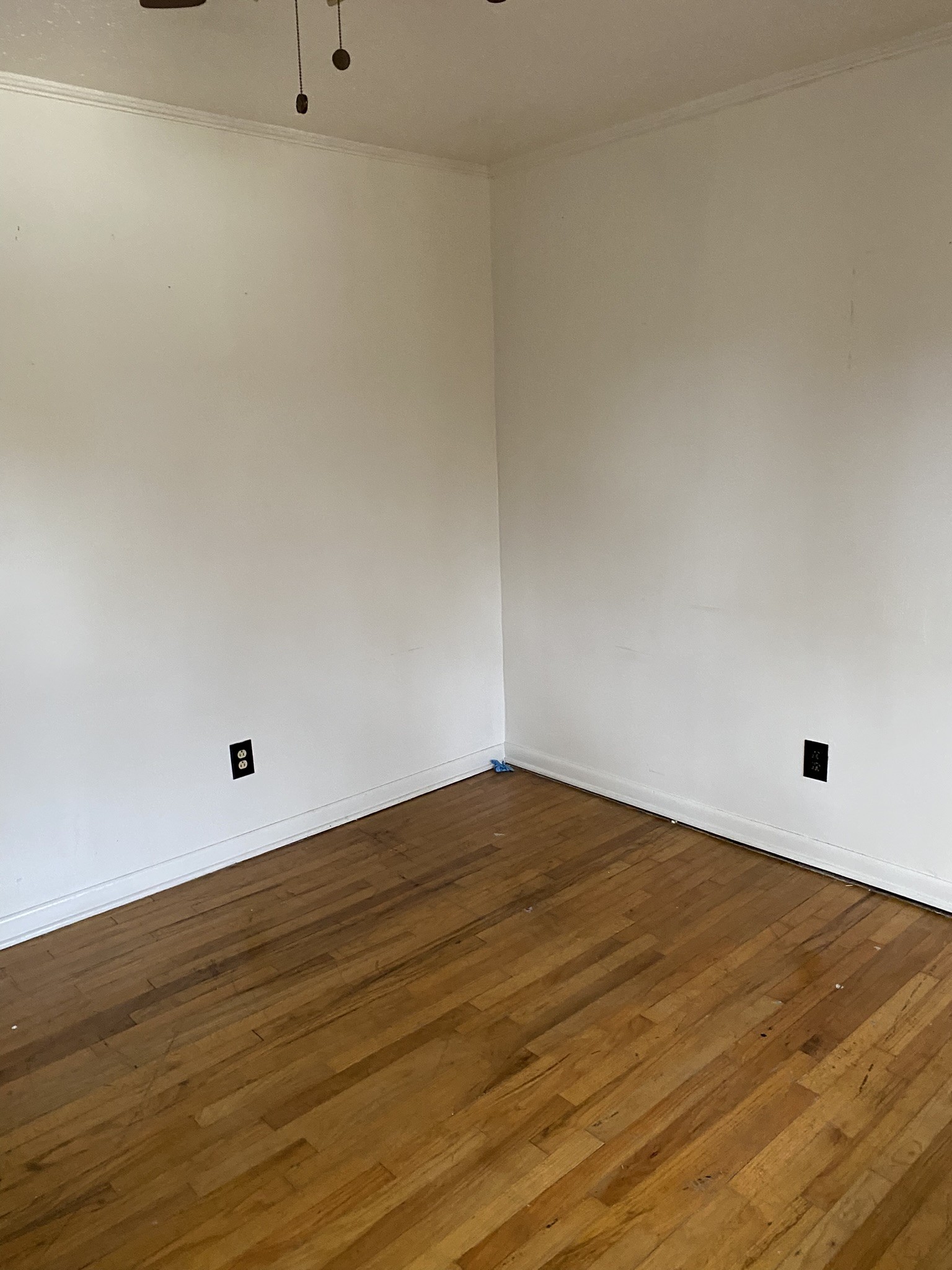 1035 North 3rd Street Pulaski, TN 38478 - Photo 4 of 17 a view of empty room with wooden floor