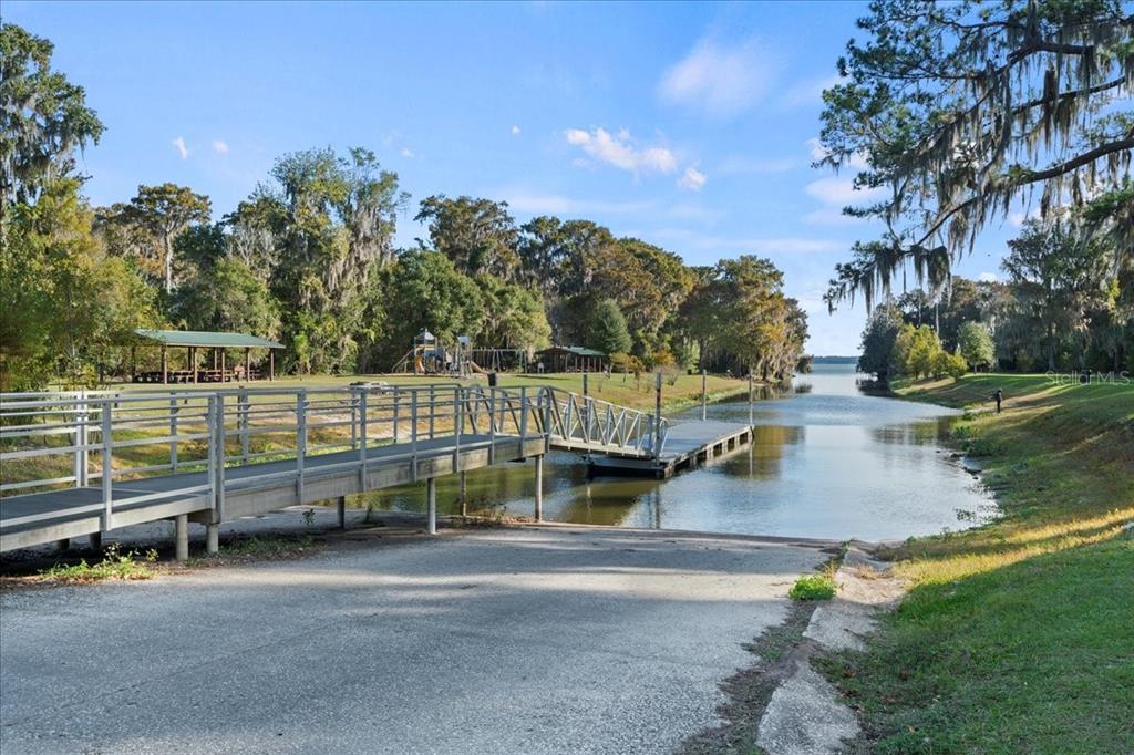 6809 Southeast 14th Lane Gainesville, FL 32641 - Photo 14 of 14 a view of a swimming pool with a patio