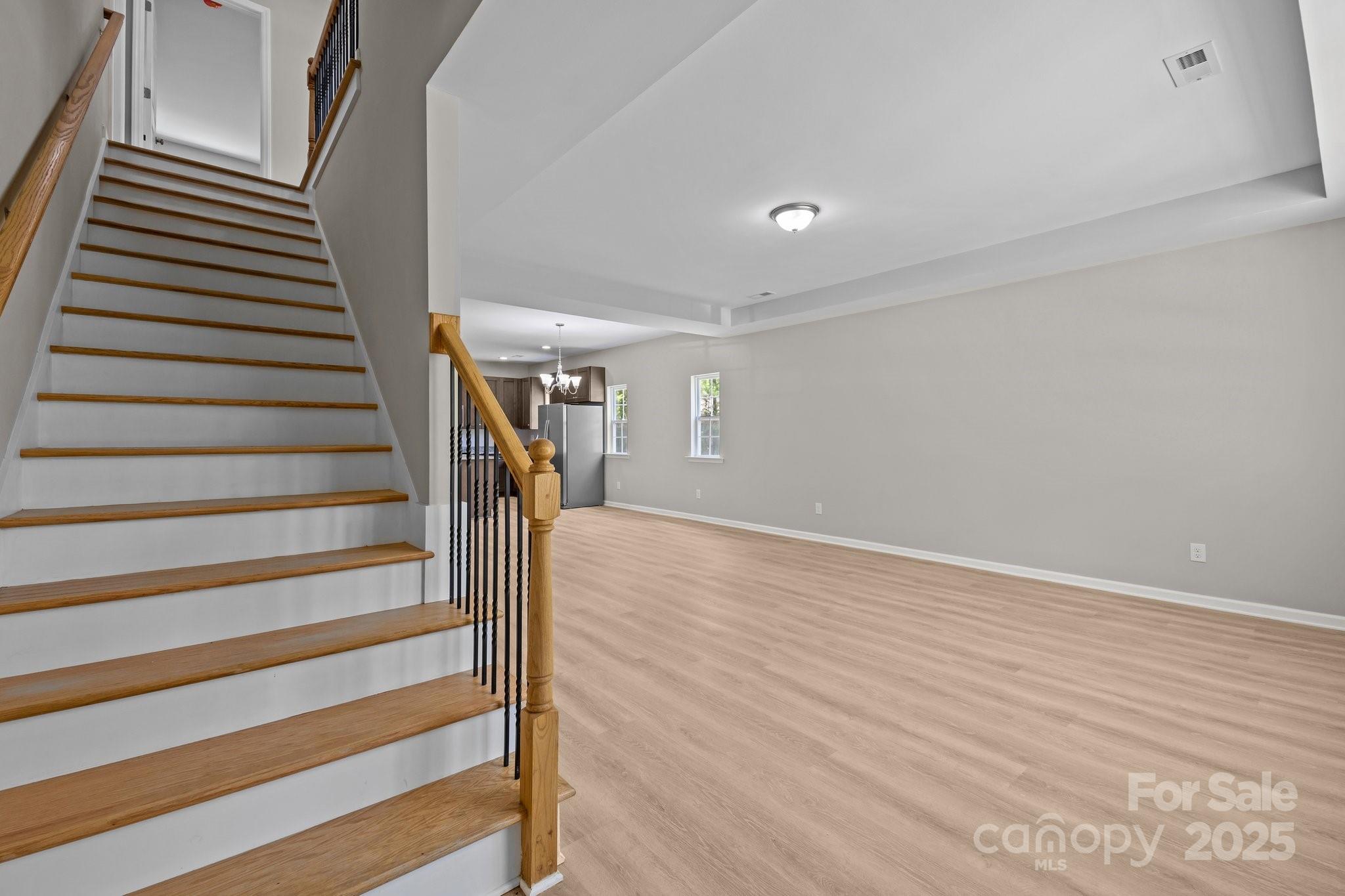 126 Aurora Boulevard Matthews, NC 28105 - Photo 17 of 41 a view of entryway with wooden floor