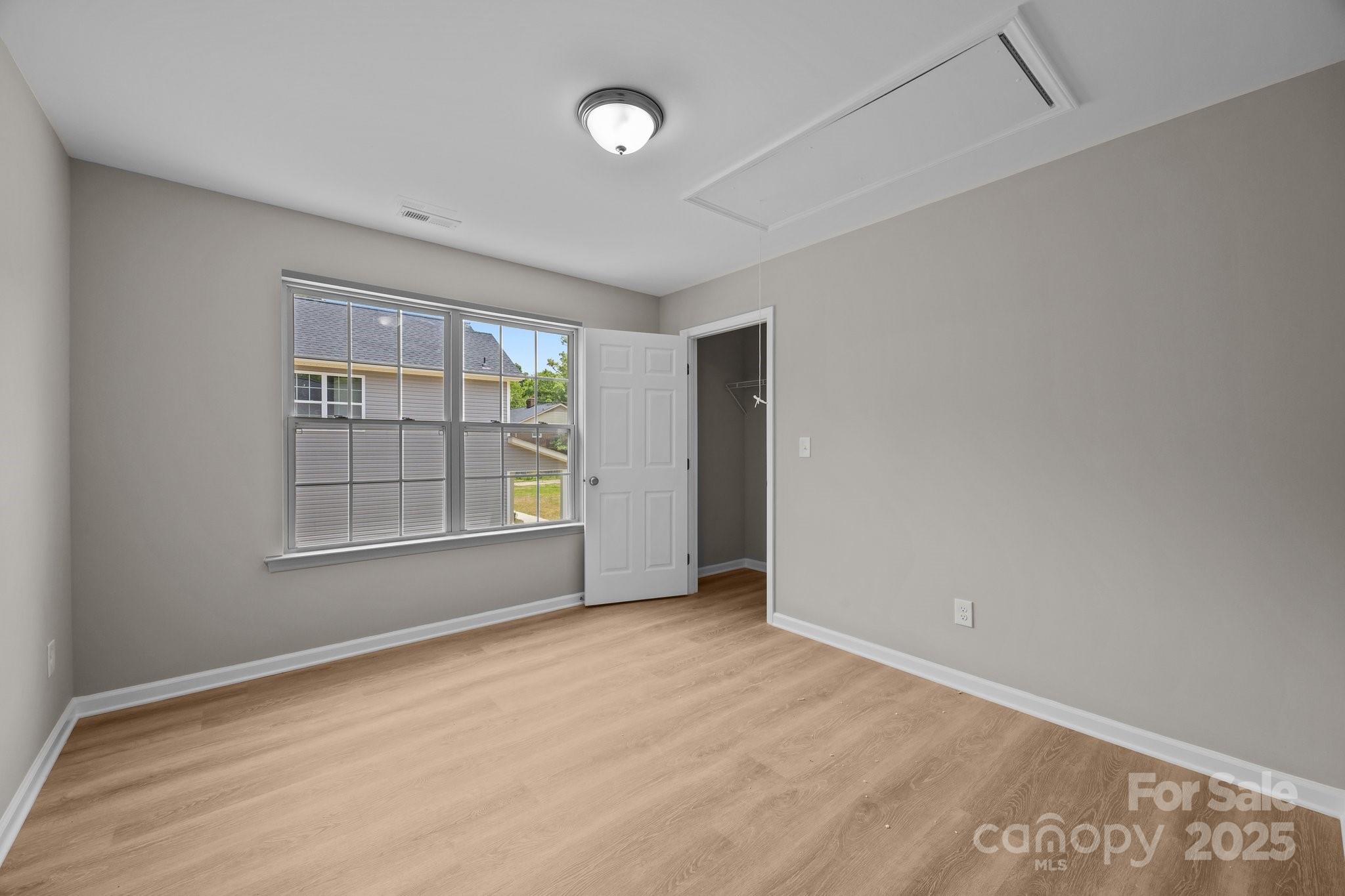 126 Aurora Boulevard Matthews, NC 28105 - Photo 30 of 41 an empty room with windows