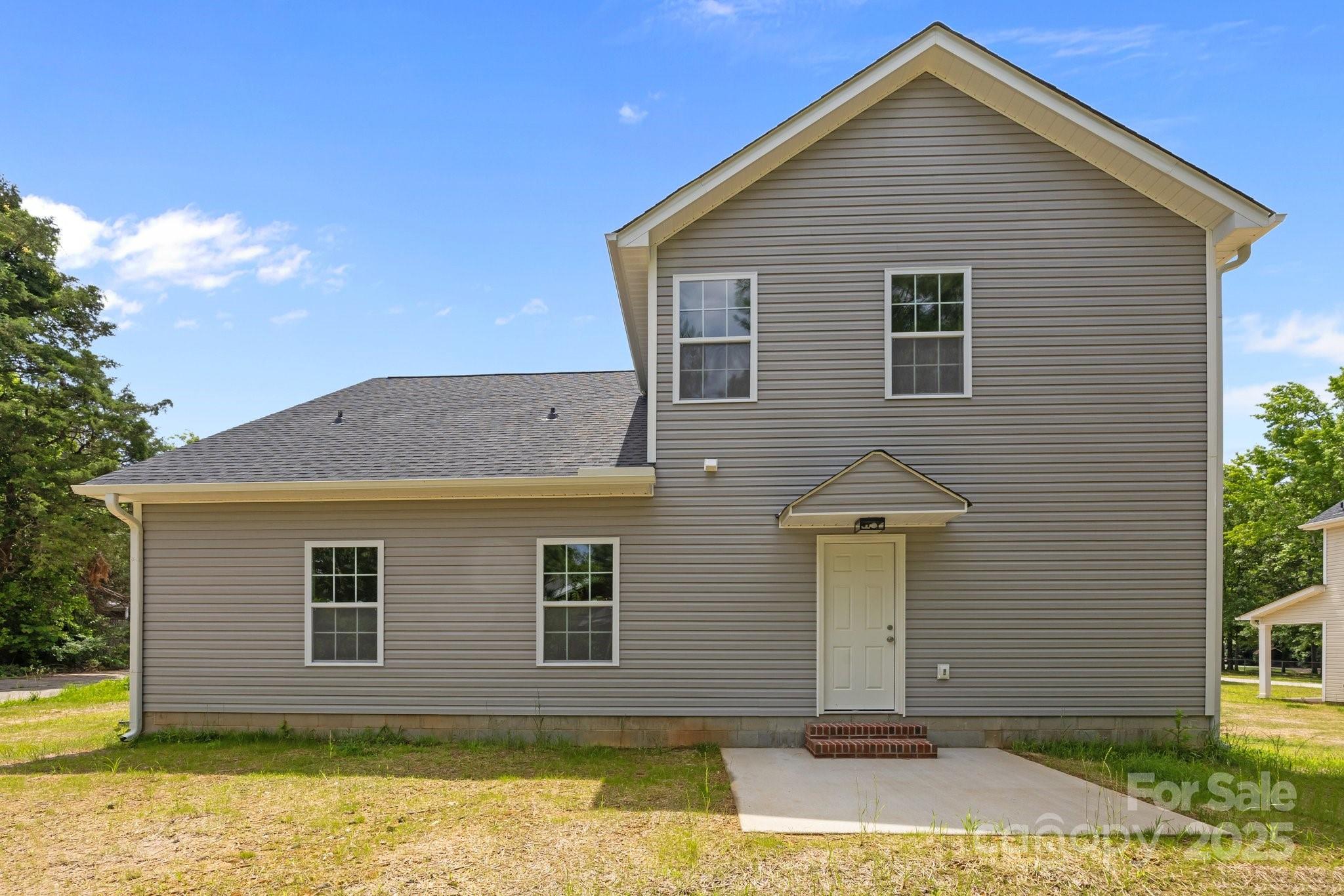 126 Aurora Boulevard Matthews, NC 28105 - Photo 36 of 41 a front view of a house