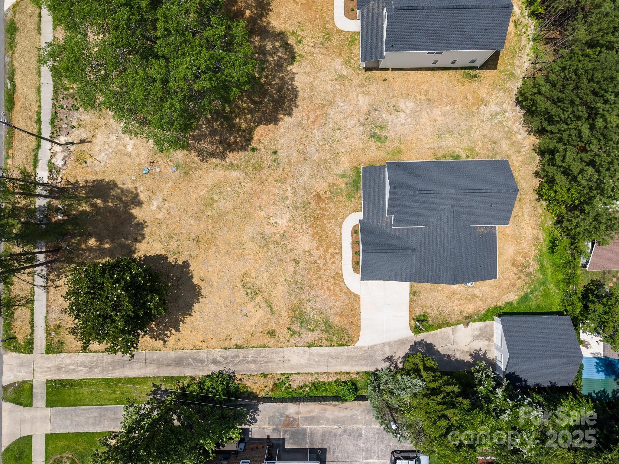 126 Aurora Boulevard Matthews, NC 28105 - Photo 37 of 41 an aerial view of a house with a yard