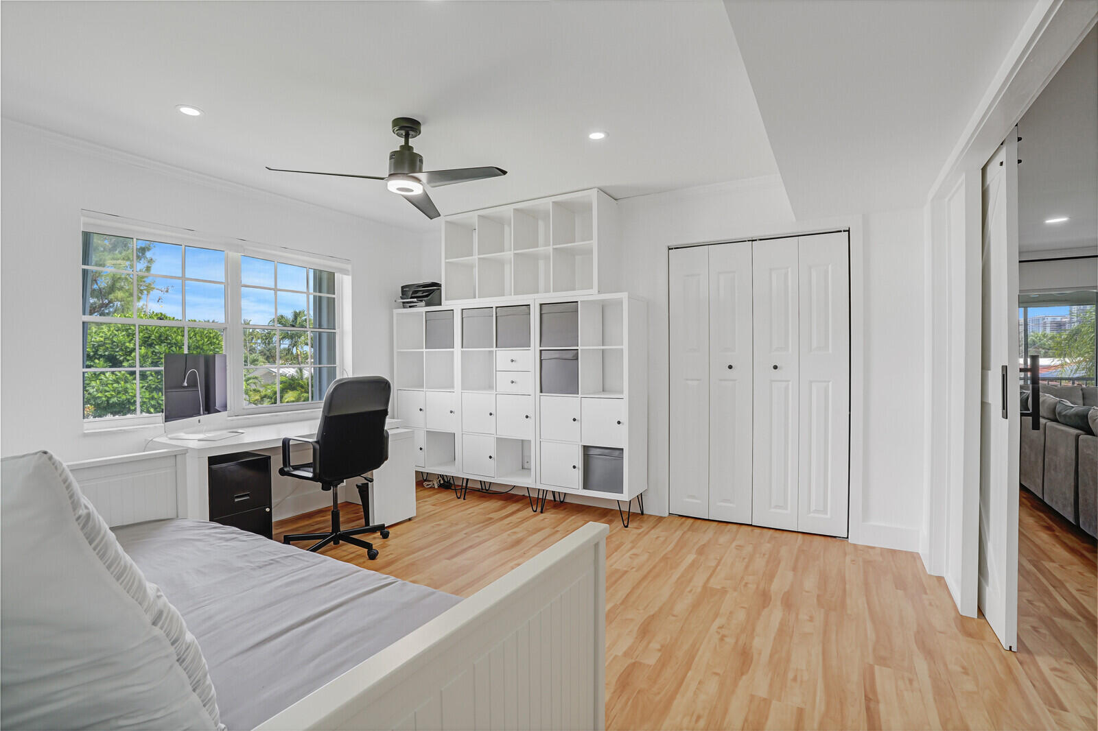 1210 Sugar Sands Boulevard, Unit 243 Singer Island, FL 33404 - Photo 27 of 55 a view of a workspace with furniture and a window