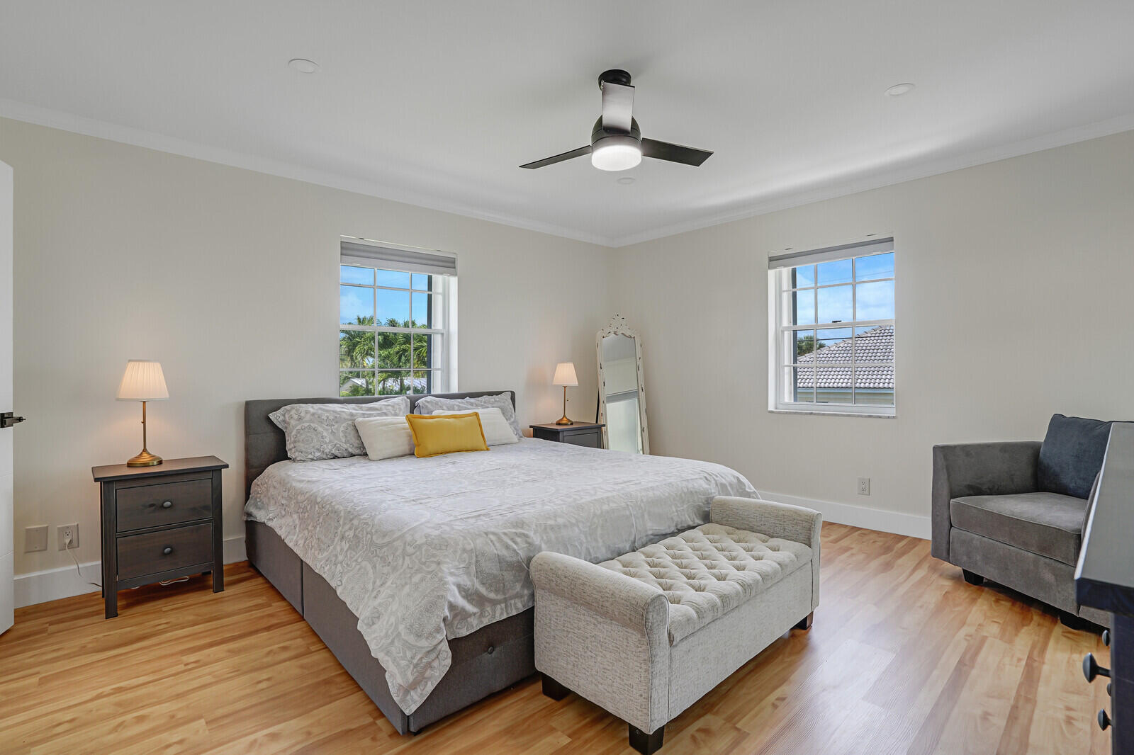 1210 Sugar Sands Boulevard, Unit 243 Singer Island, FL 33404 - Photo 28 of 55 a bedroom with a bed and a couch