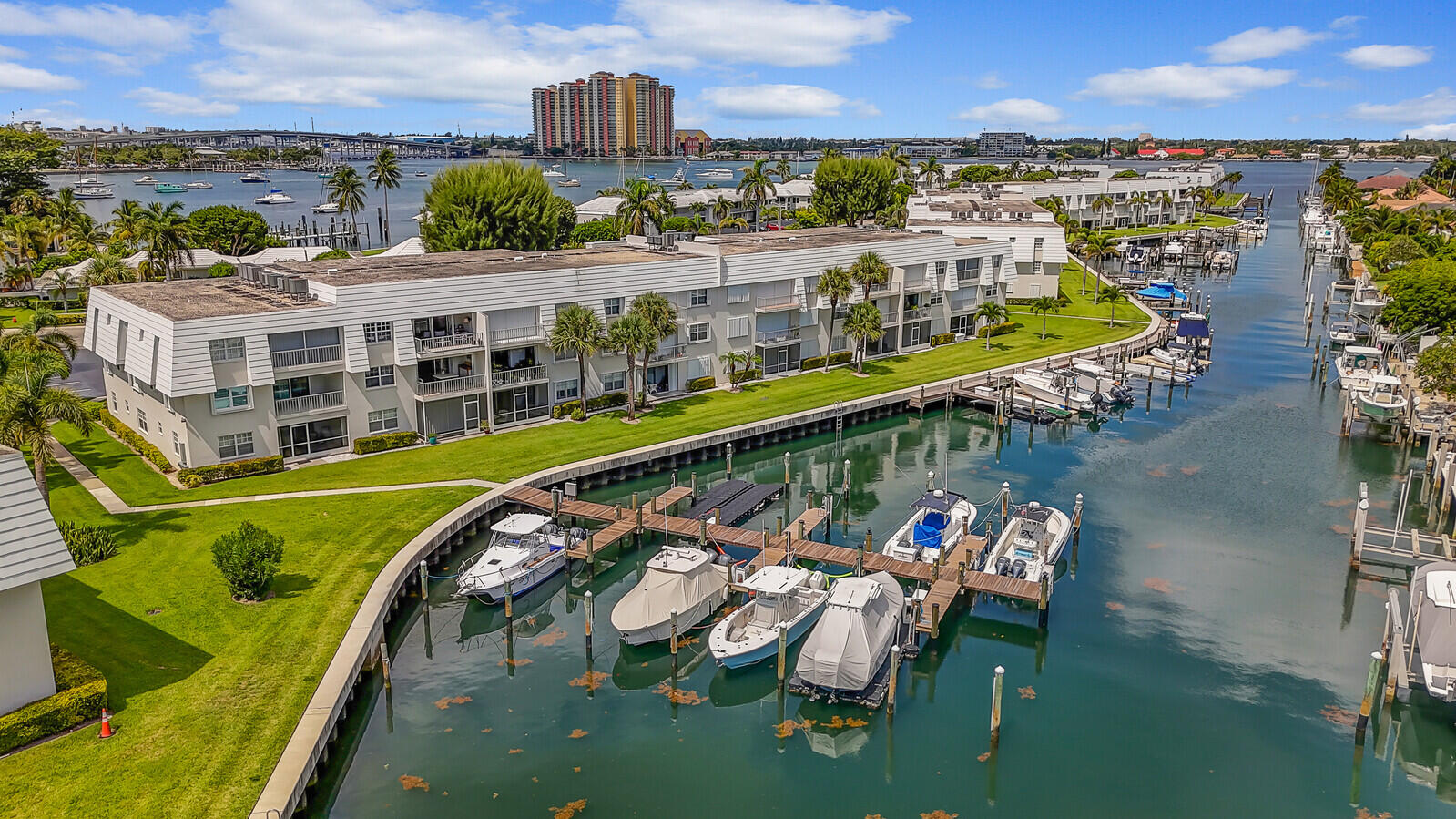 1210 Sugar Sands Boulevard, Unit 243 Singer Island, FL 33404 - Photo 54 of 55 a view of a city from a balcony with outdoor seating
