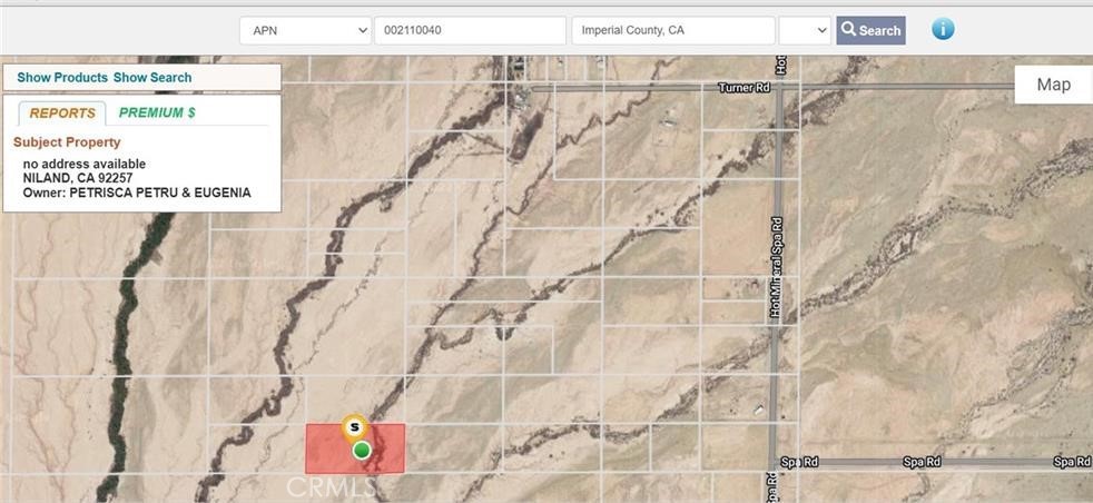 a picture of a bathroom with a white wall and a shower