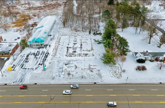 a view of outdoor space with a car park side of a street