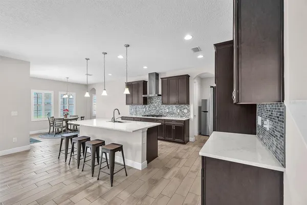 a view of a dining room with furniture window and outside view