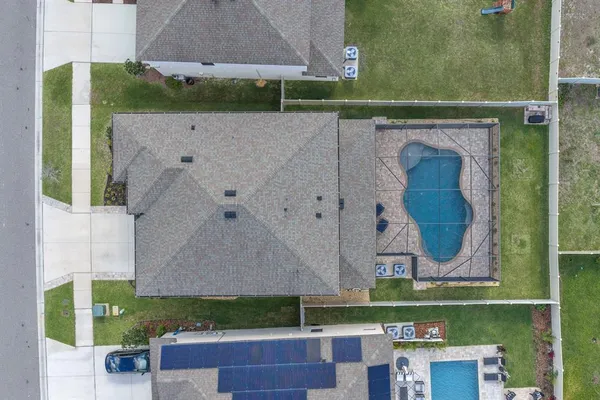 a view of swimming pool with a yard