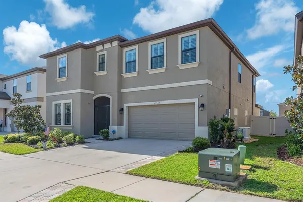 an aerial view of a swimming pool and outdoor space