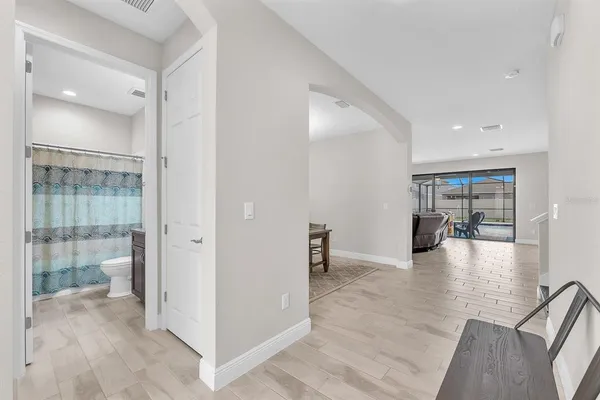 a view of a dining room with furniture window and outside view