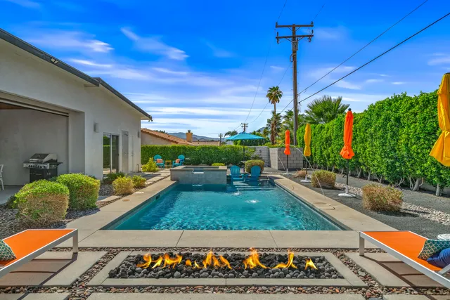 a outdoor living space with furniture and garden view