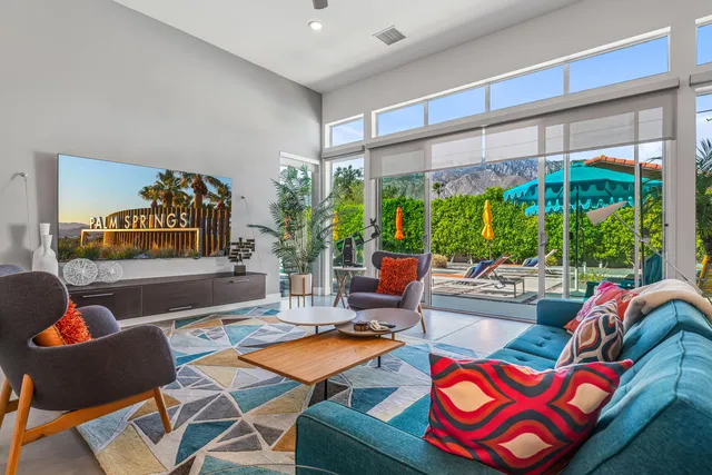 a kitchen with stainless steel appliances a stove a sink island and a refrigerator