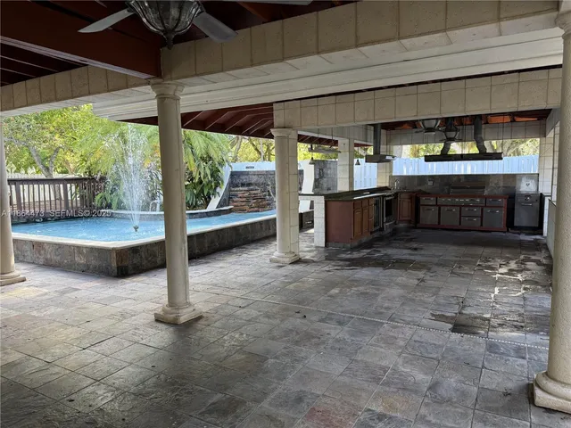 a view of a porch with furniture