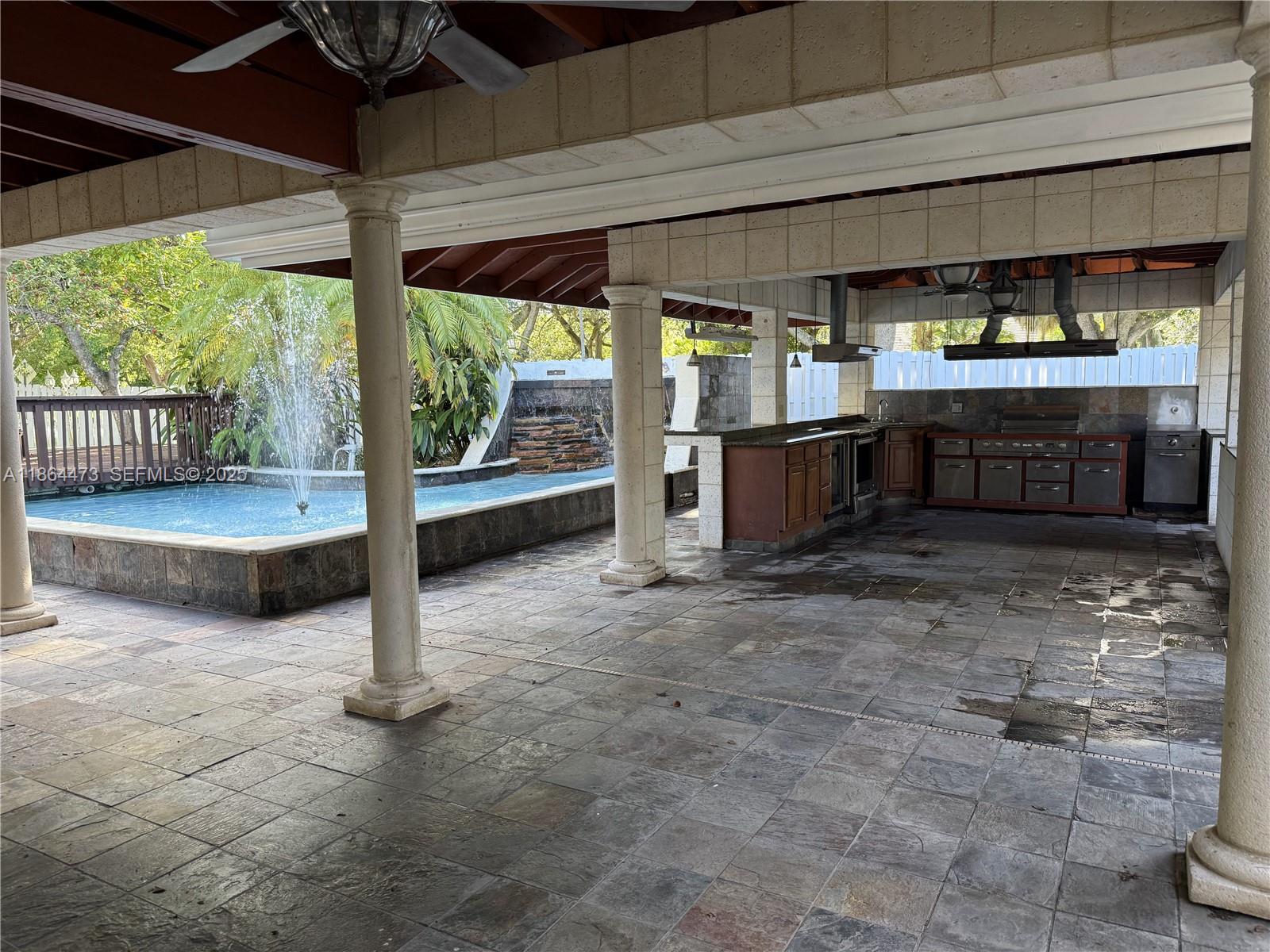 15051 Southwest 149th Street Miami, FL 33196 - Photo 4 of 20 a view of a porch with furniture