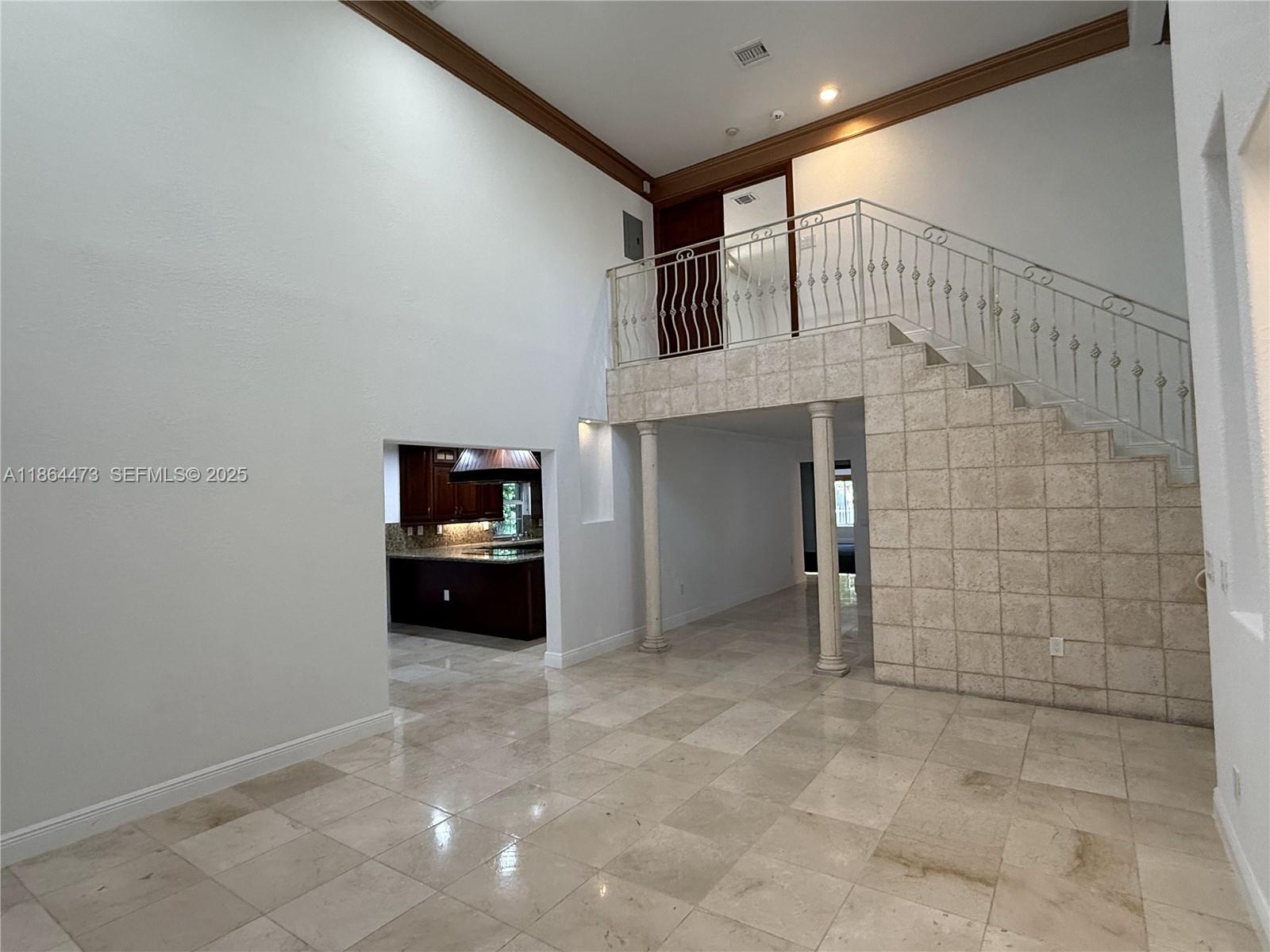 15051 Southwest 149th Street Miami, FL 33196 - Photo 8 of 20 a living room with a couch