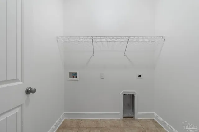 a view of an empty room with a windows