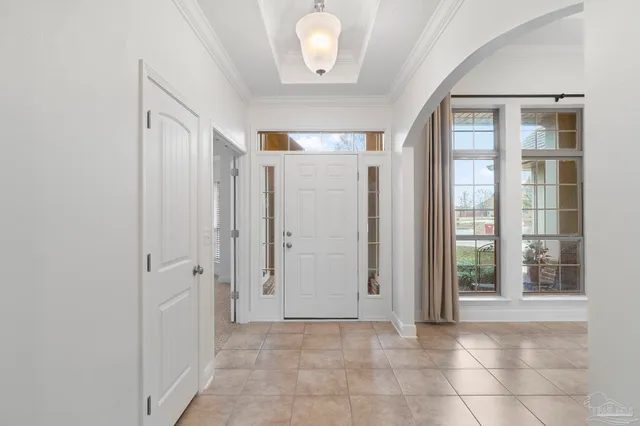 a view of a hallway with front door