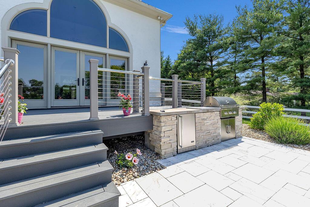 2570 Jewett Road Powell, OH 43065 - Photo 77 of 104 77. Rear Deck, Outdoor Kitchen