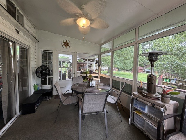 2795 East 28th Road Marseilles, IL 61341 - Photo 45 of 91 a dining room with furniture and a floor to ceiling window