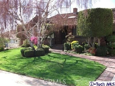 901 Birmingham Road Burbank, CA 91504 - Photo 1 of 1 a view of a house with a backyard and garden
