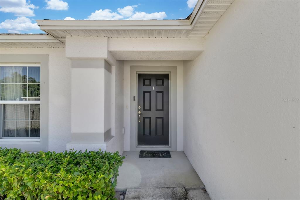 205 Arbuthnot Street Winter Haven, FL 33881 - Photo 29 of 31 a view of front door