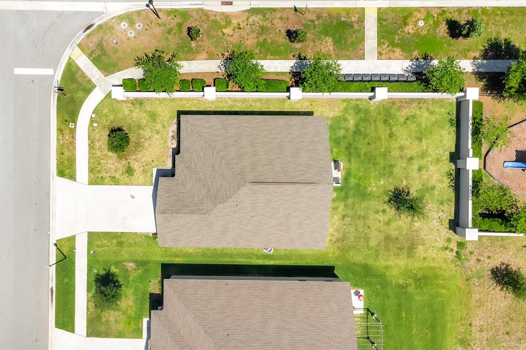 205 Arbuthnot Street Winter Haven, FL 33881 - Photo 5 of 31 an aerial view of a house with a swimming pool