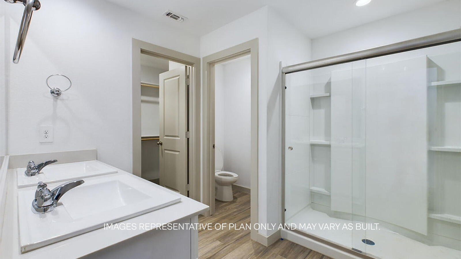 7419 9th Street Lubbock, TX 79416 - Photo 15 of 21 a bathroom with a sink a toilet and shower