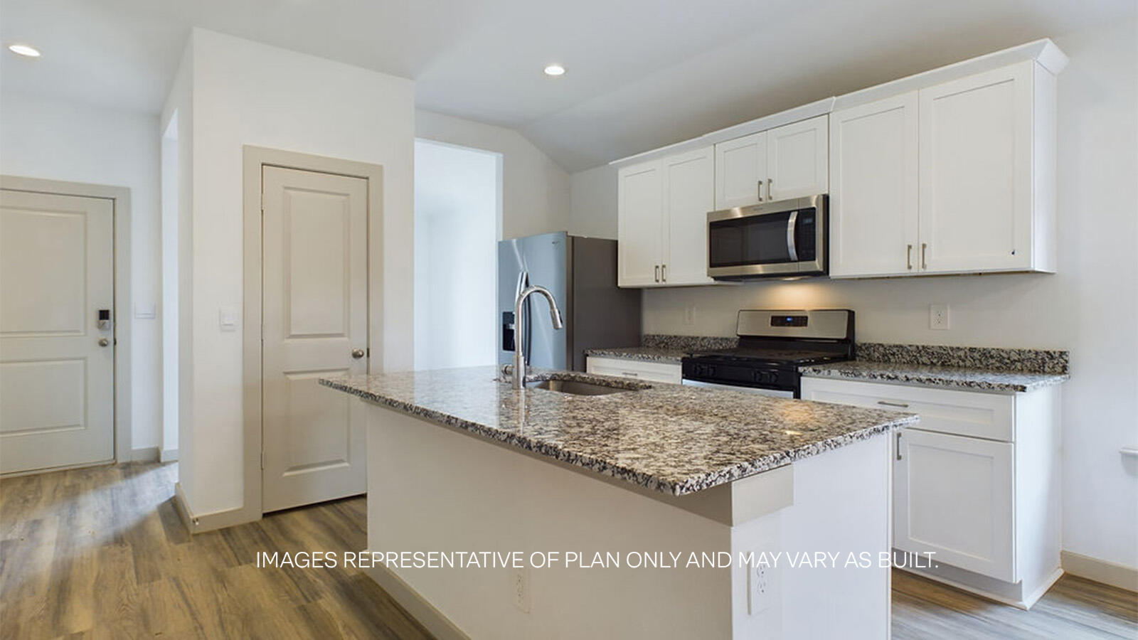 7419 9th Street Lubbock, TX 79416 - Photo 5 of 21 a kitchen with stainless steel appliances granite countertop a sink stove and refrigerator