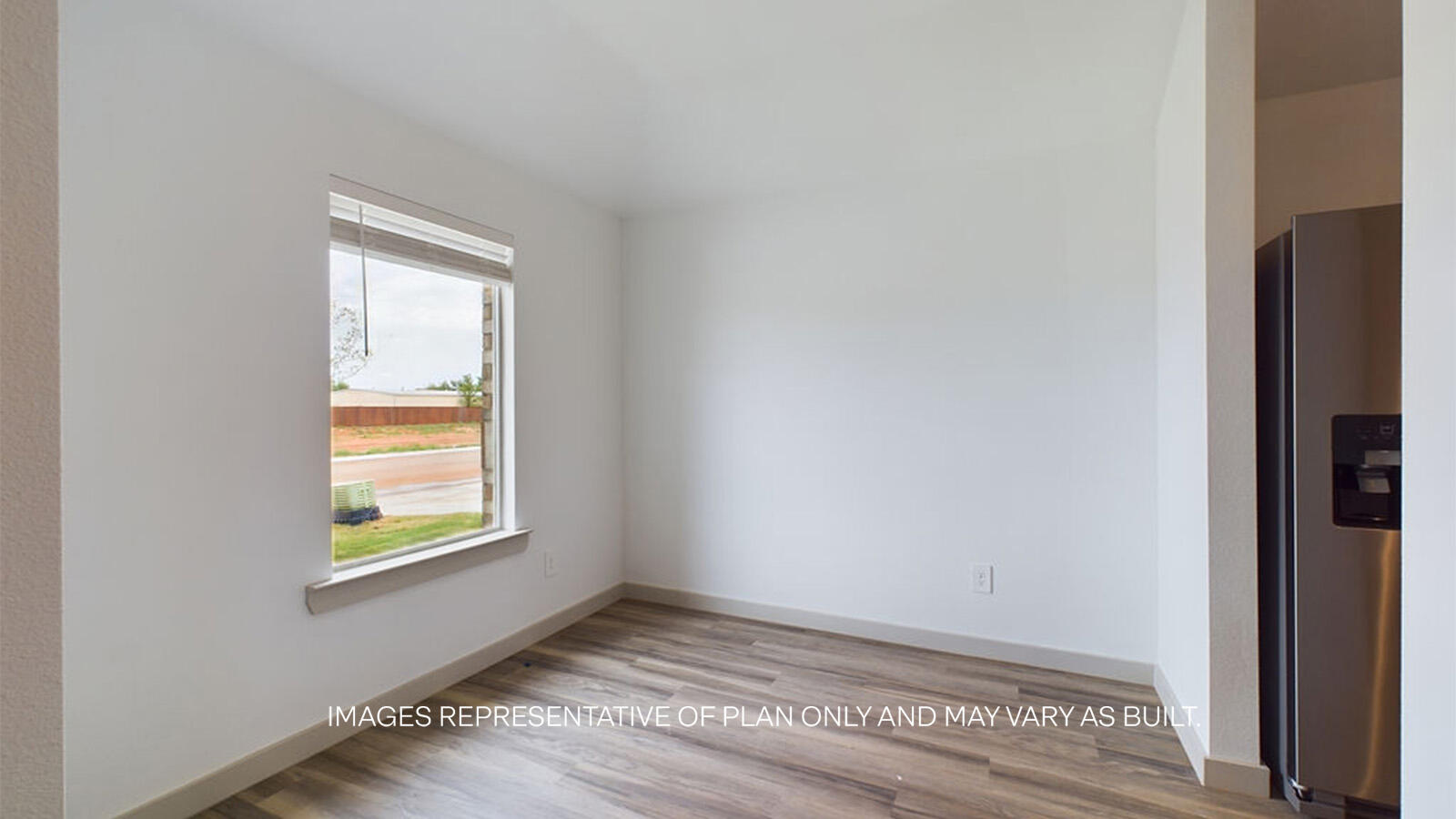7419 9th Street Lubbock, TX 79416 - Photo 7 of 21 a view of an empty room and window