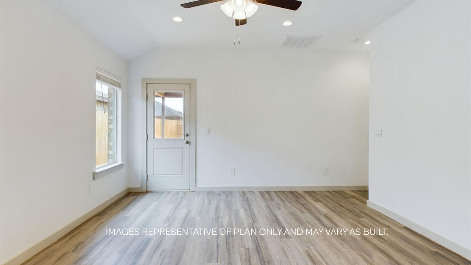 7419 9th Street Lubbock, TX 79416 - Photo 10 of 21 wooden floor in an empty room with a window