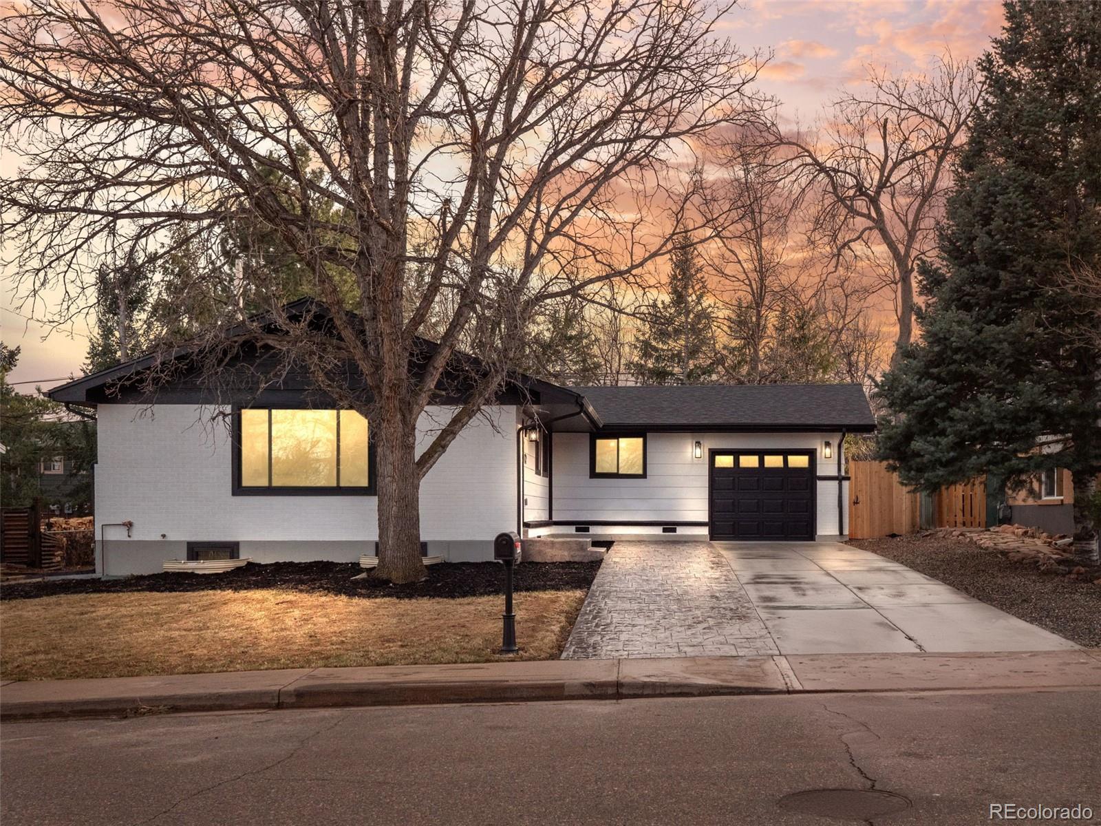 3490 Emerson Avenue Boulder, CO 80305 - Photo 1 of 31 a house view with a yard