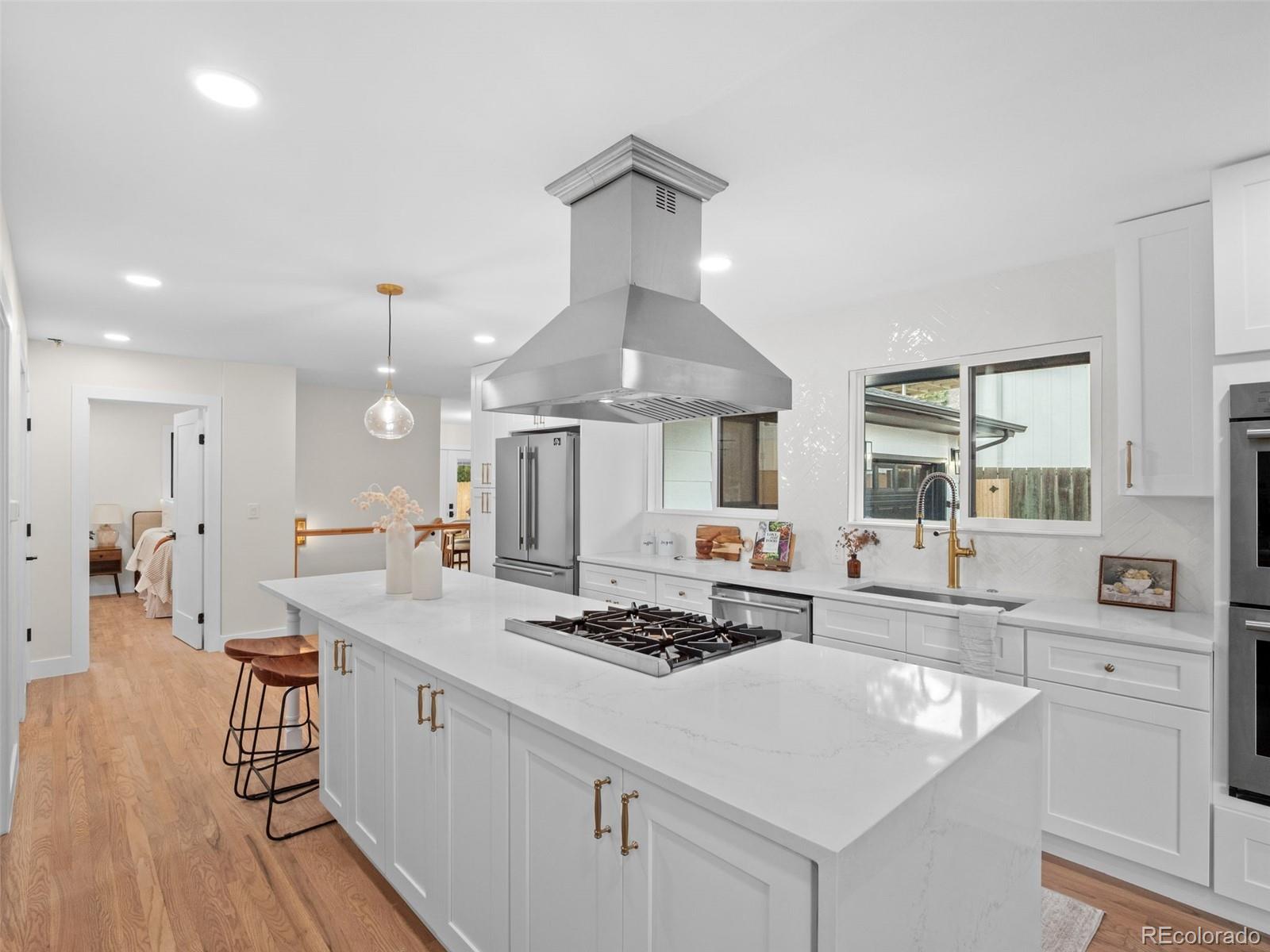 3490 Emerson Avenue Boulder, CO 80305 - Photo 1 of 31 a kitchen with sink refrigerator and cabinets