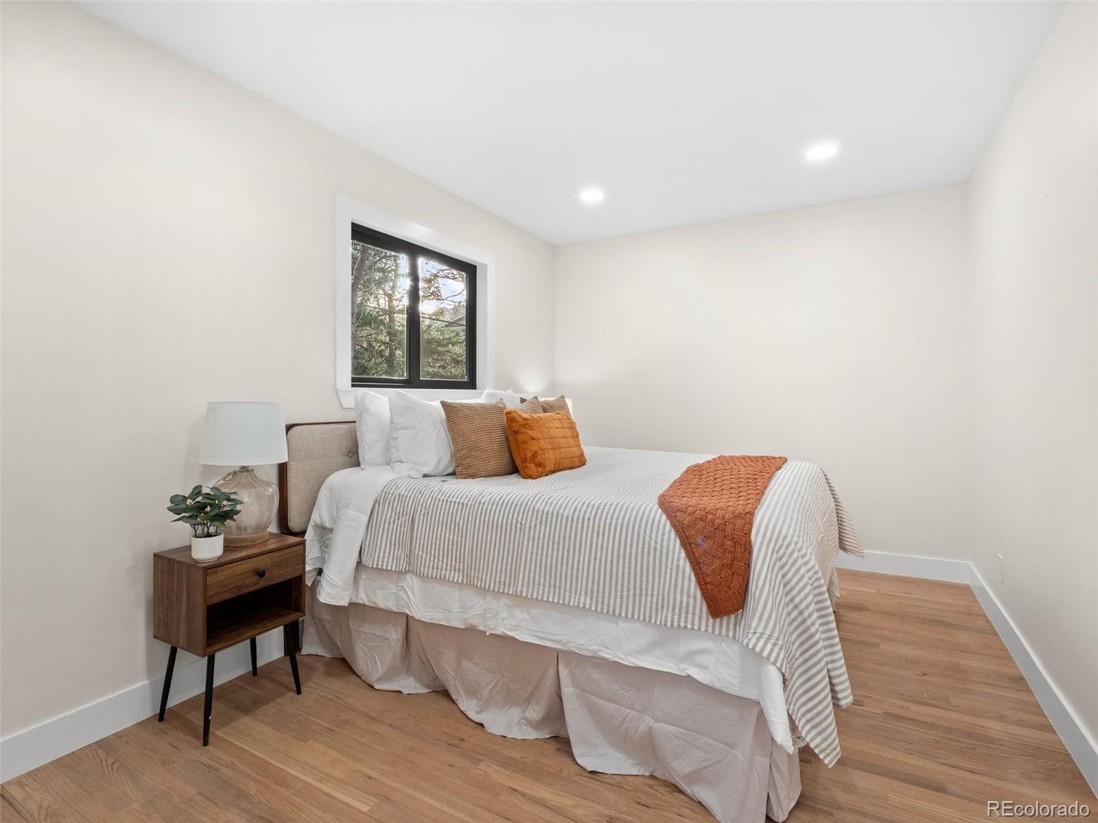 3490 Emerson Avenue Boulder, CO 80305 - Photo 12 of 31 a bedroom with bed and window