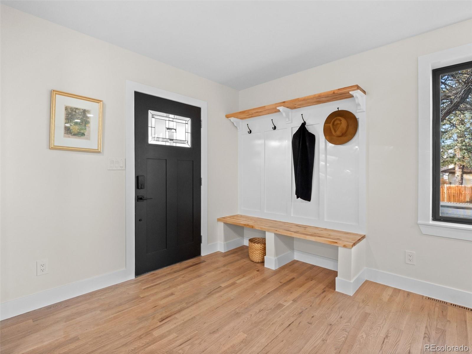 3490 Emerson Avenue Boulder, CO 80305 - Photo 2 of 31 a bedroom with a bed and a window