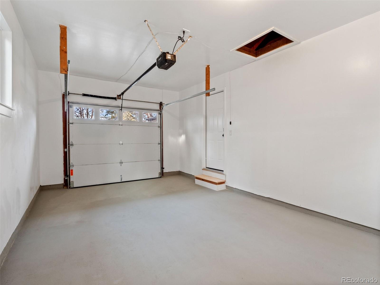 3490 Emerson Avenue Boulder, CO 80305 - Photo 26 of 31 an empty room with windows