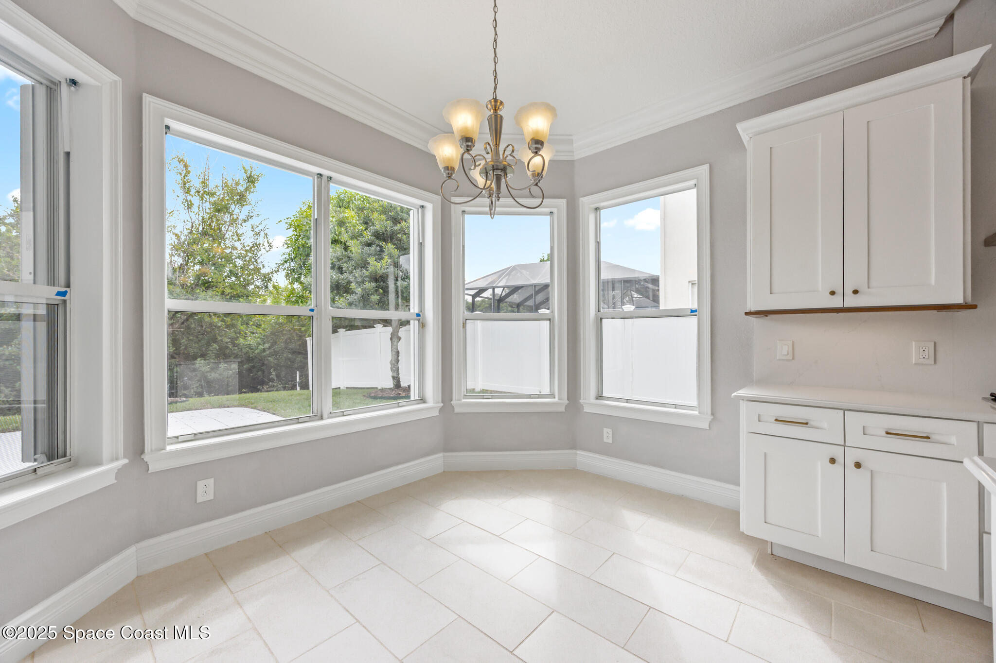 3326 Peninsula Circle Melbourne, FL 32940 - Photo 14 of 53 a view of an empty room with a window