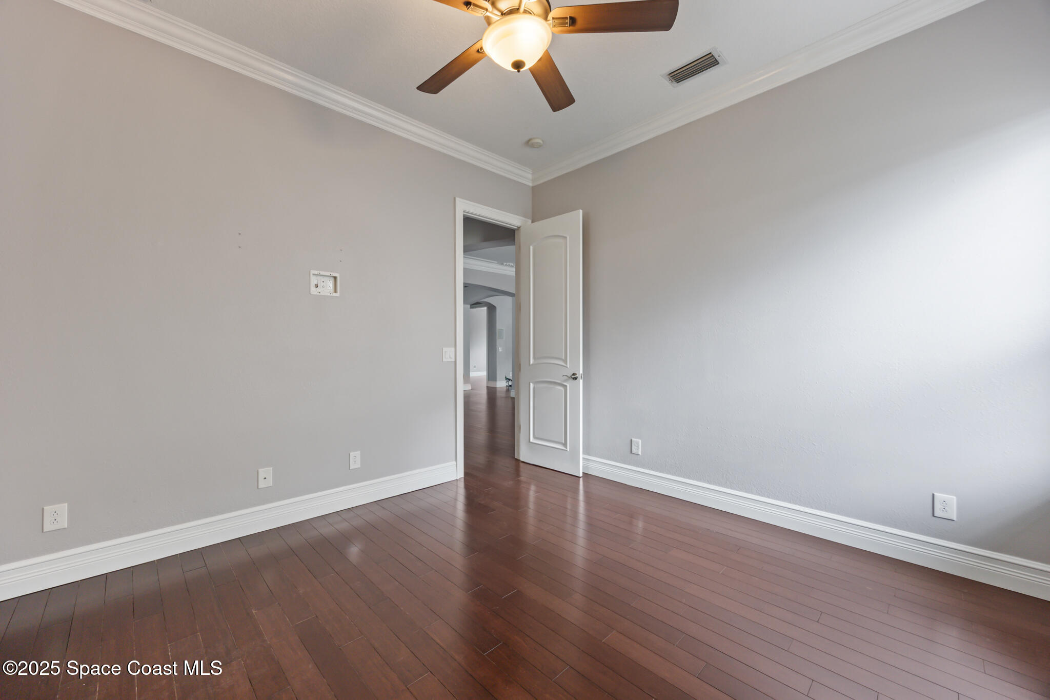 3326 Peninsula Circle Melbourne, FL 32940 - Photo 23 of 53 a view of an empty room with wooden floor