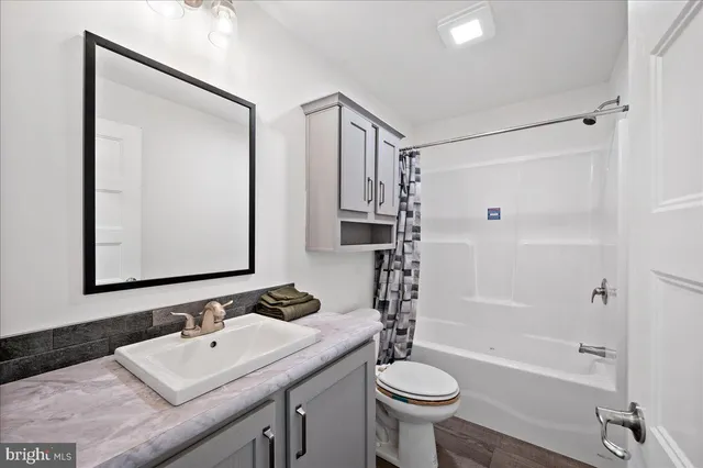 a workspace with furniture and window