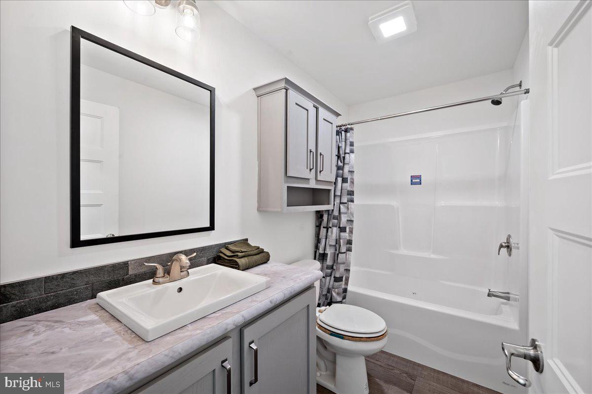 3983 Hastings Road Walnutport, PA 18088 - Photo 19 of 51 a bathroom with a sink toilet tub and shower