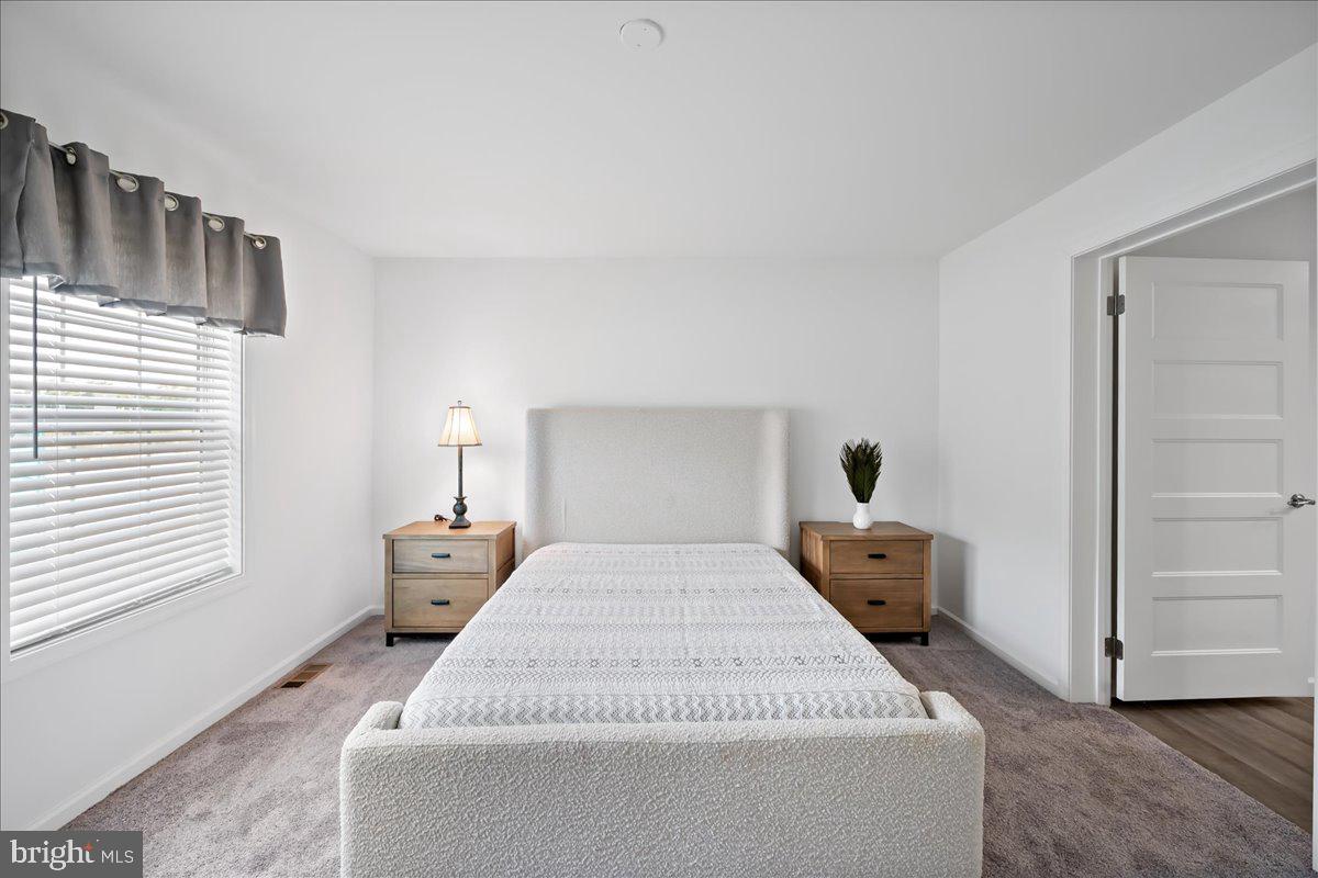 3983 Hastings Road Walnutport, PA 18088 - Photo 25 of 51 a bed sitting in a bedroom next to a window