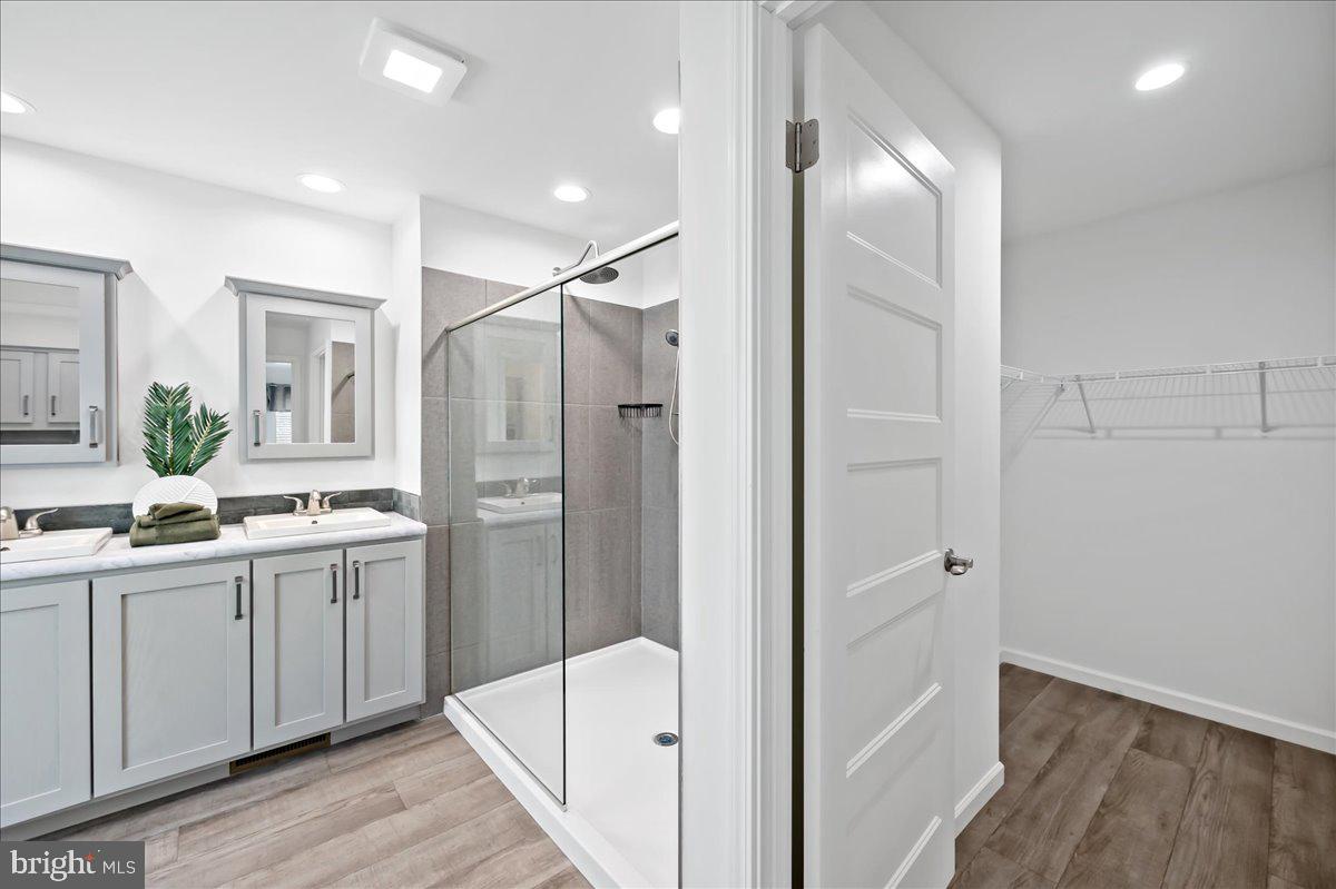 3983 Hastings Road Walnutport, PA 18088 - Photo 27 of 51 a bathroom with a double vanity sink mirror and shower