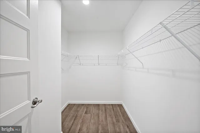 a bathroom with a sink a vanity and a mirror