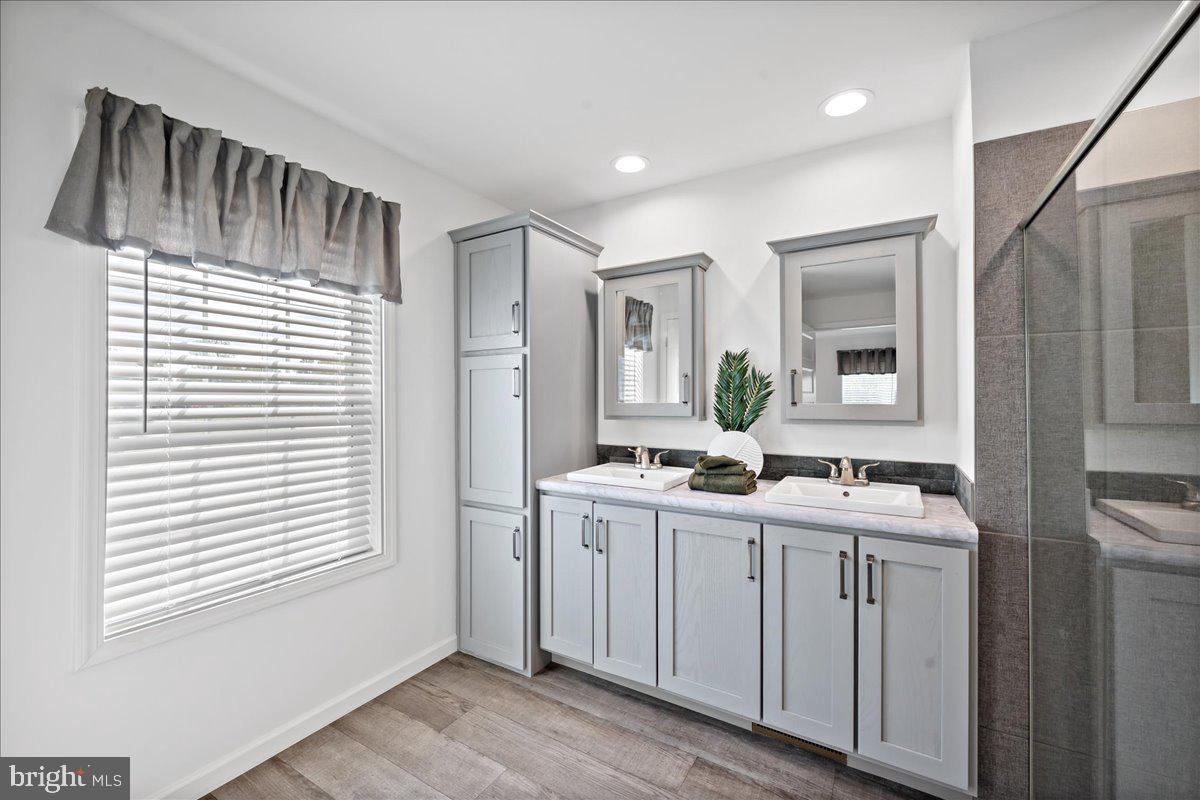 3983 Hastings Road Walnutport, PA 18088 - Photo 29 of 51 a bathroom with a sink a vanity and a mirror