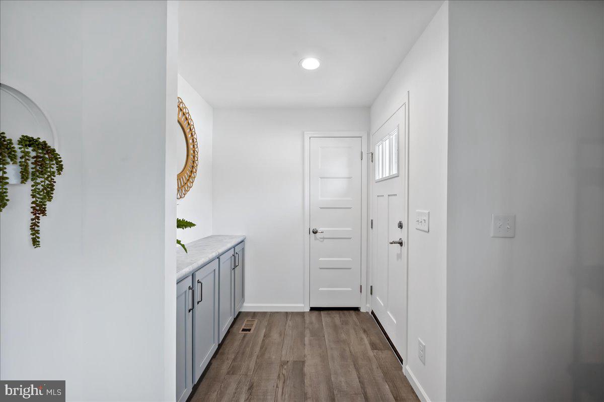 3983 Hastings Road Walnutport, PA 18088 - Photo 5 of 51 a view of a hallway with wooden floor